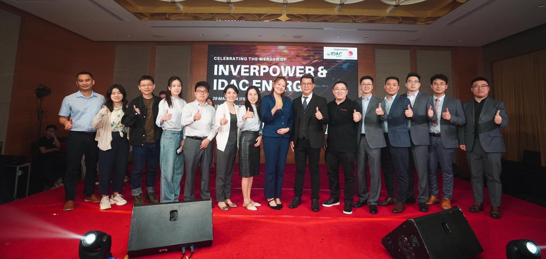 InverPower and IDAC Energy team on stage at the 2024 merger celebration, Sunway Resort Hotel